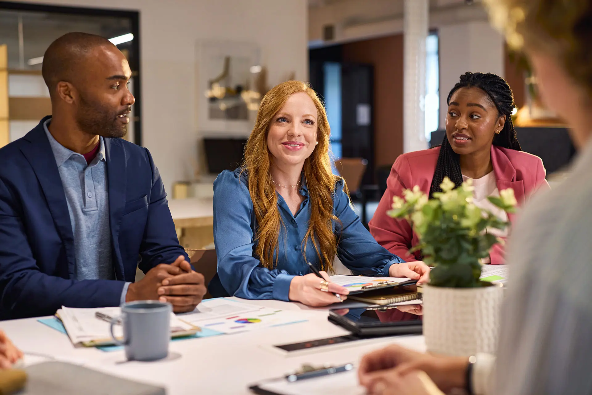Business professionals discussing business reports and business growth strategies